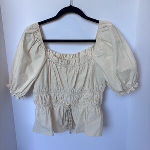 Moon river Cotton Peplum Top In Cream
